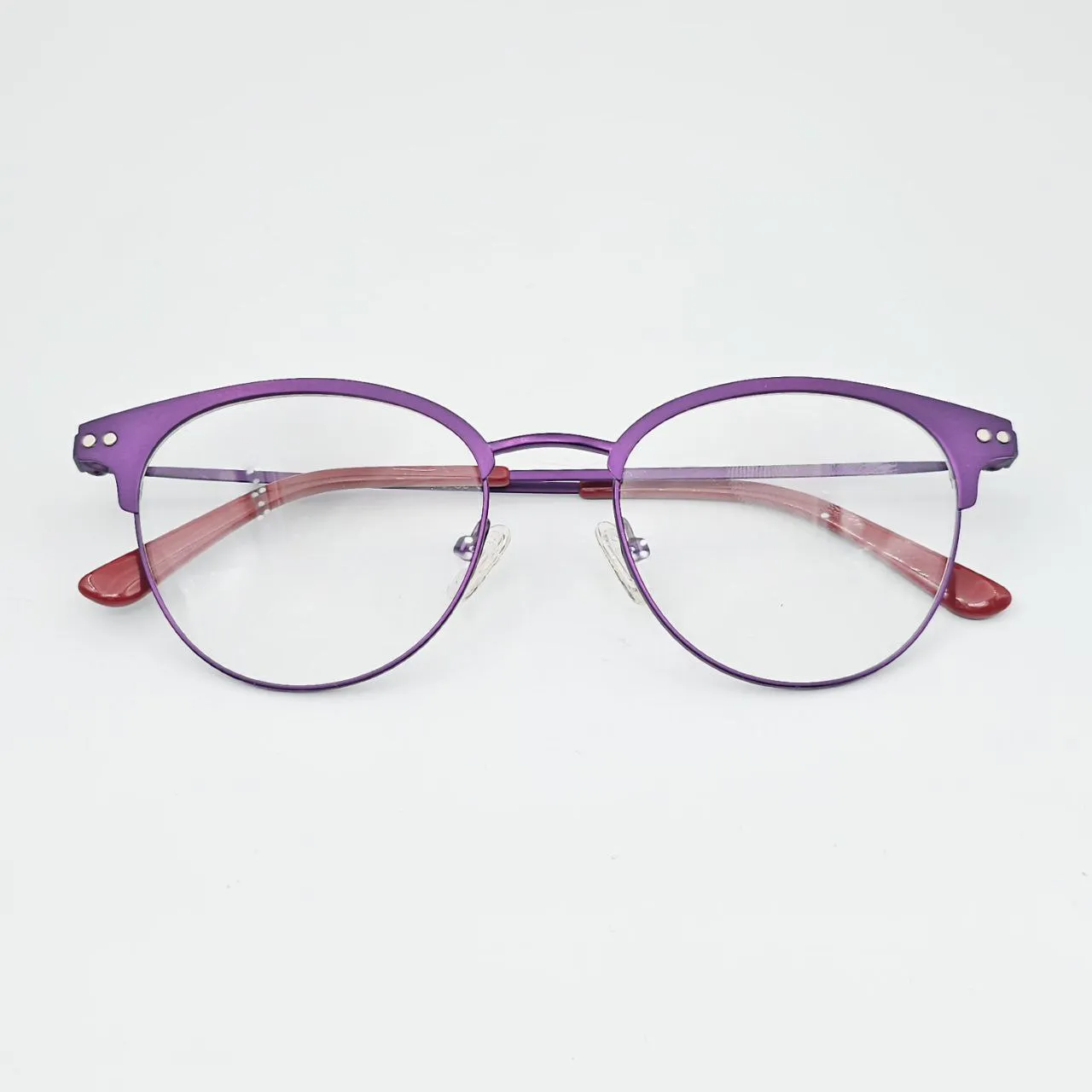 عکس نمای از بالا عینک طبی زنانه با کاور آفتابی رنگ purple