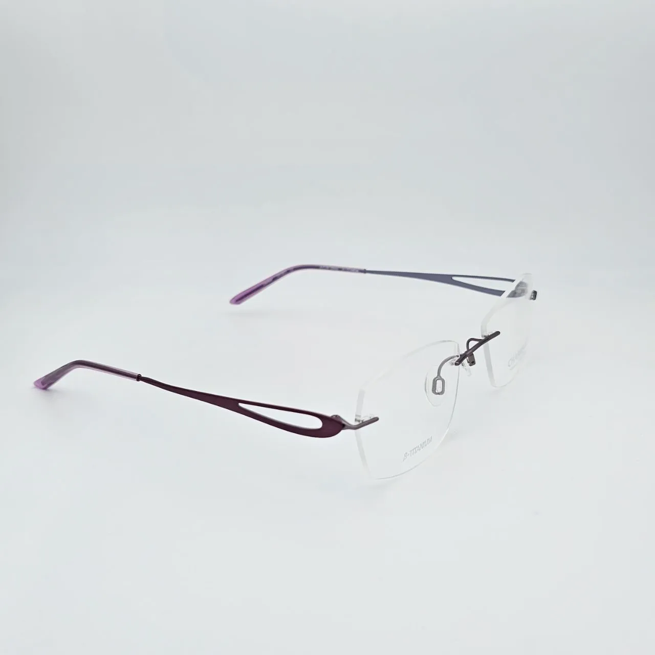 عکس نمای 45 درجه عینک طبی برند charmant مدل titanium perfection کد ۱۴۴۸ رنگ purple