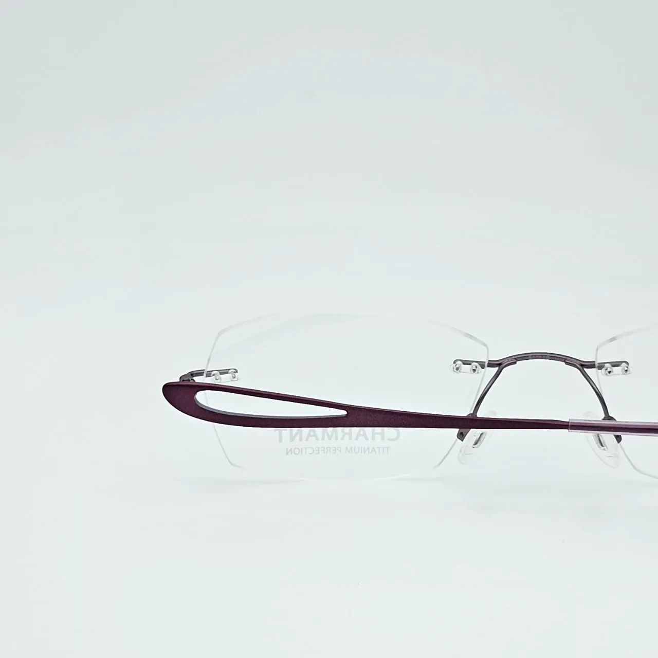عکس نمای دسته عینک طبی برند charmant مدل titanium perfection کد ۱۴۴۸ رنگ purple