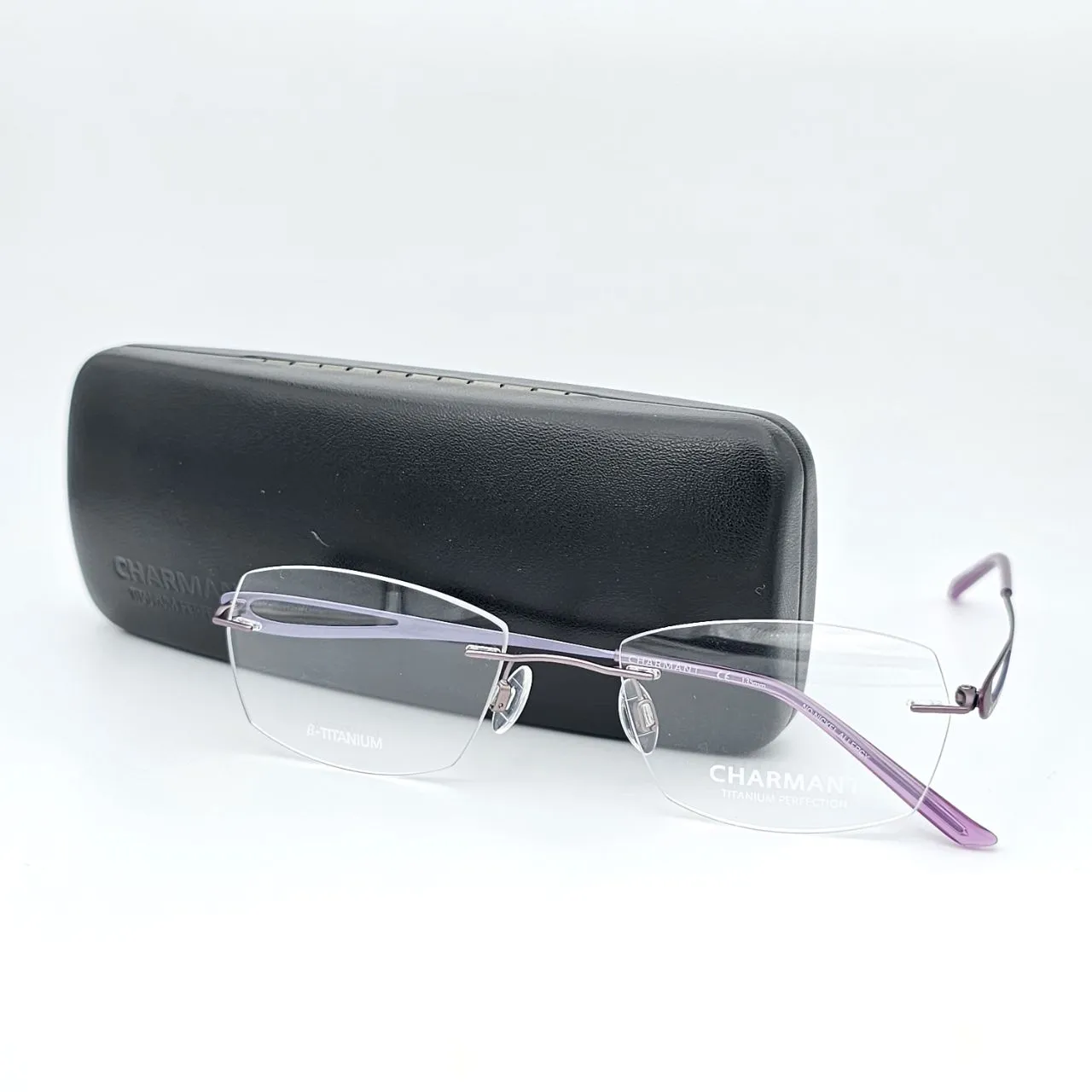 عکس نمای از بالا عینک طبی برند charmant مدل titanium perfection کد ۱۴۴۸ رنگ purple