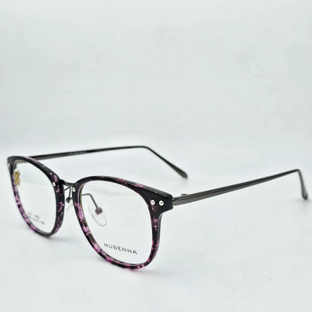 عکس نمای 45 درجه عینک طبی زنانه برند MUSENNA کد ۱۶۲۷ رنگ black,purple