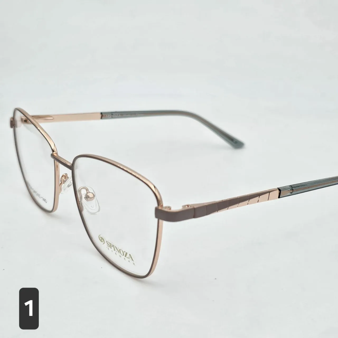 خرید عینک طبی زنانه فتوکرومیک فلزی دسته فنری برند Spinoza کد ۱۶۸۸ رنگ gold:طلایی شکلاتی,brown