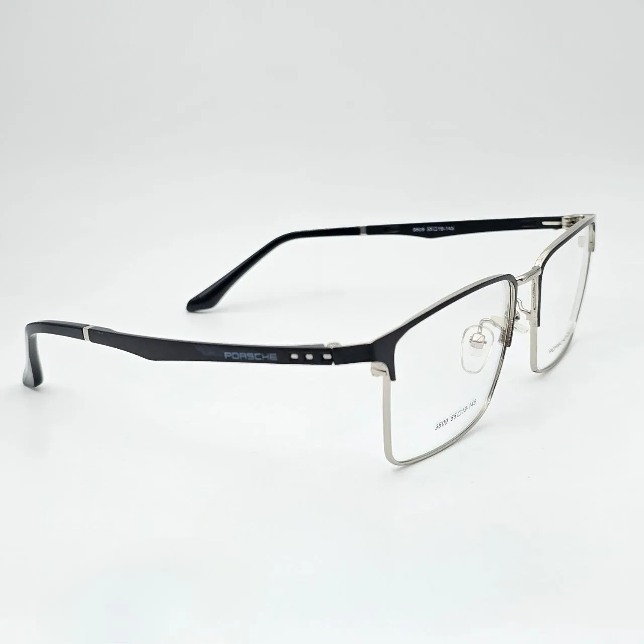 عکس نمای 45 درجه عینک طبی PORSCHE DESIGN رنگ black,silver