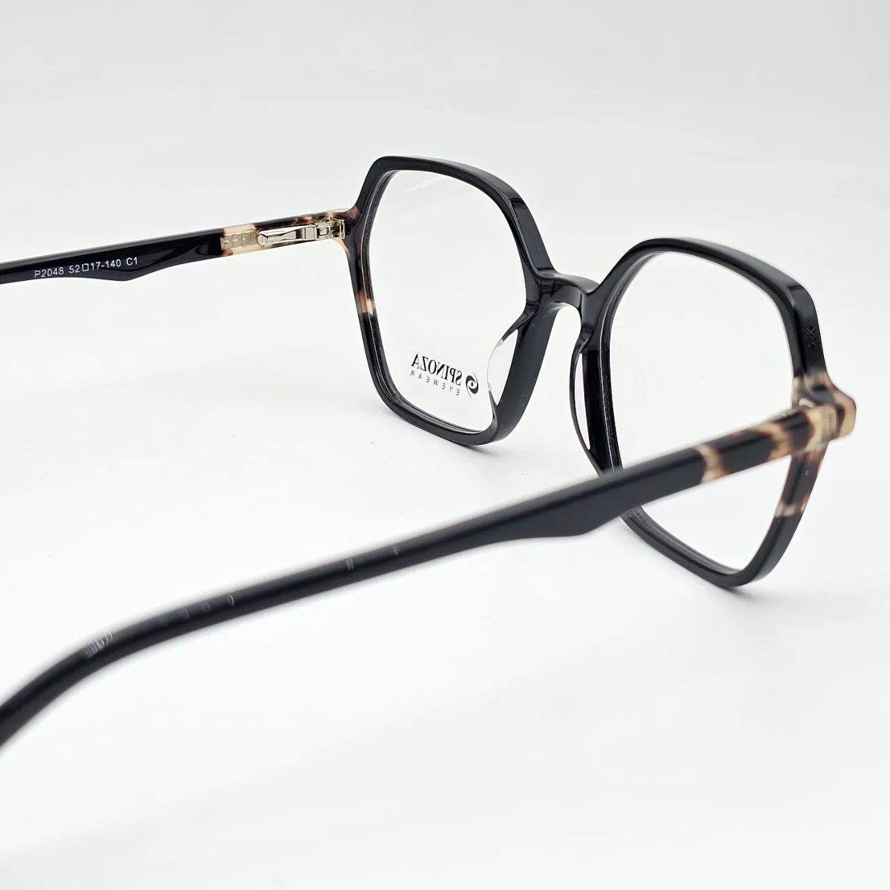 عکس نمای 45 درجه عینک زنانه چندضلعی Spinoza رنگ black,brown