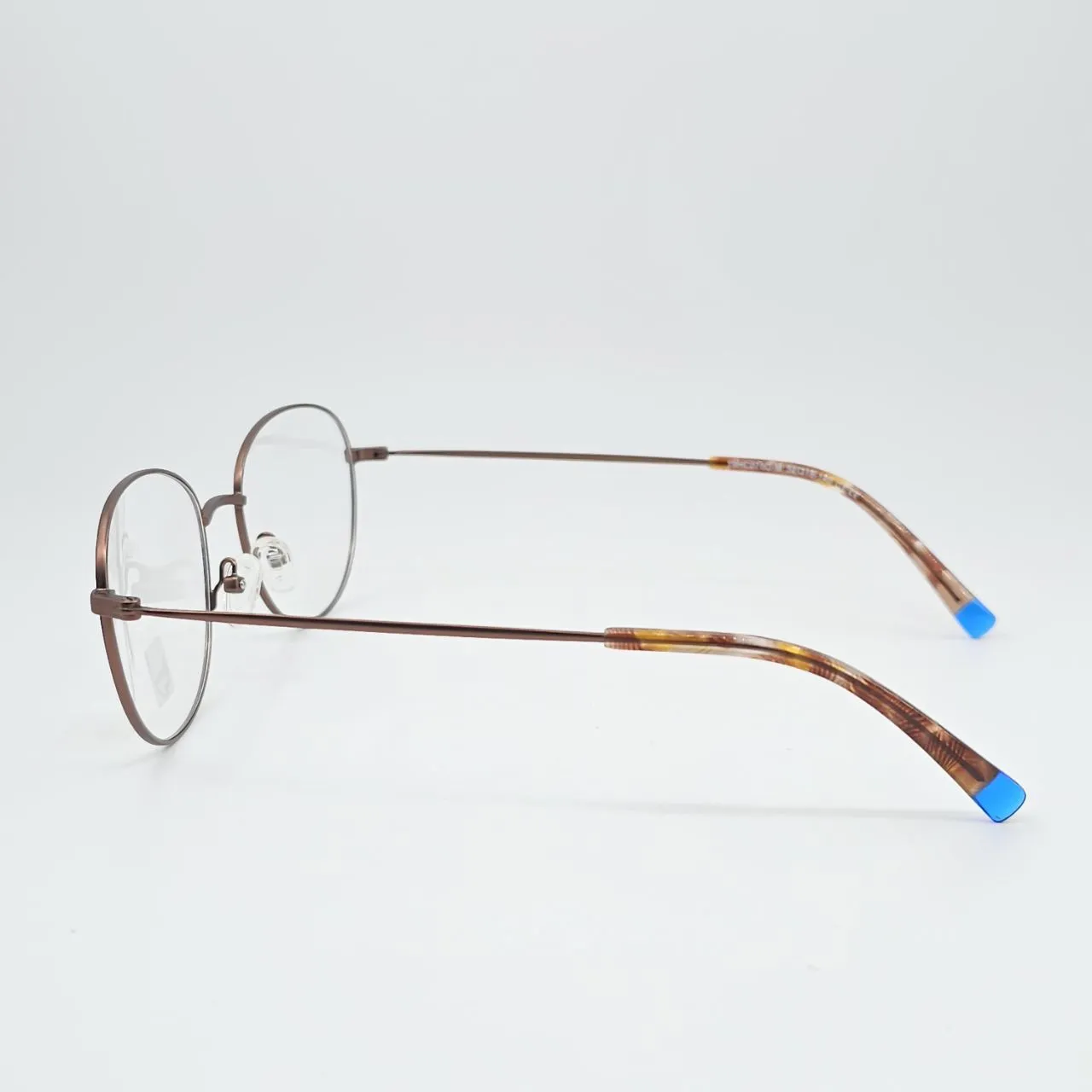 عکس نمای 45 درجه عینک زنانه فلزی کاوردار بنفش رنگ brown,blue