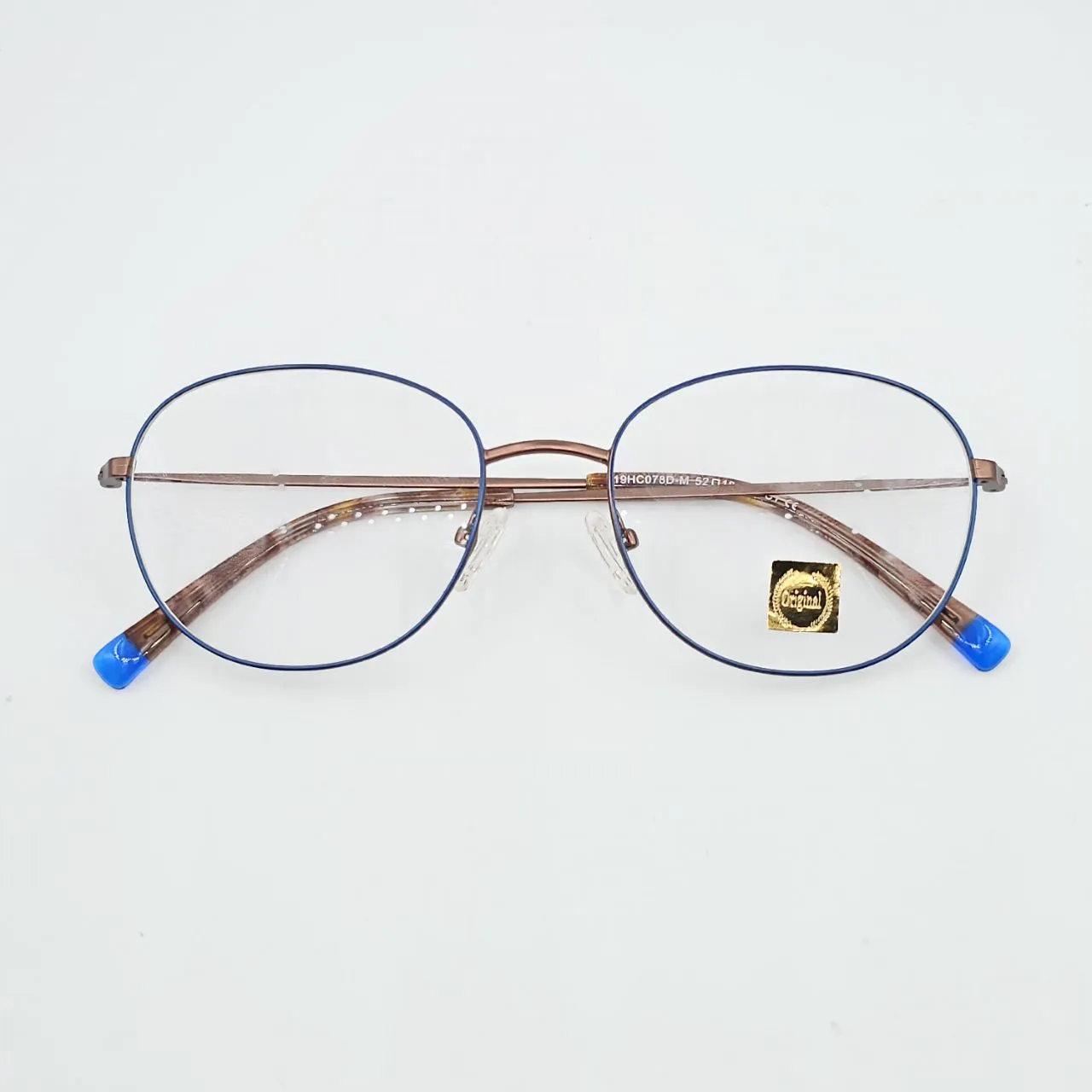 عکس نمای دسته عینک زنانه فلزی کاوردار بنفش رنگ brown,blue