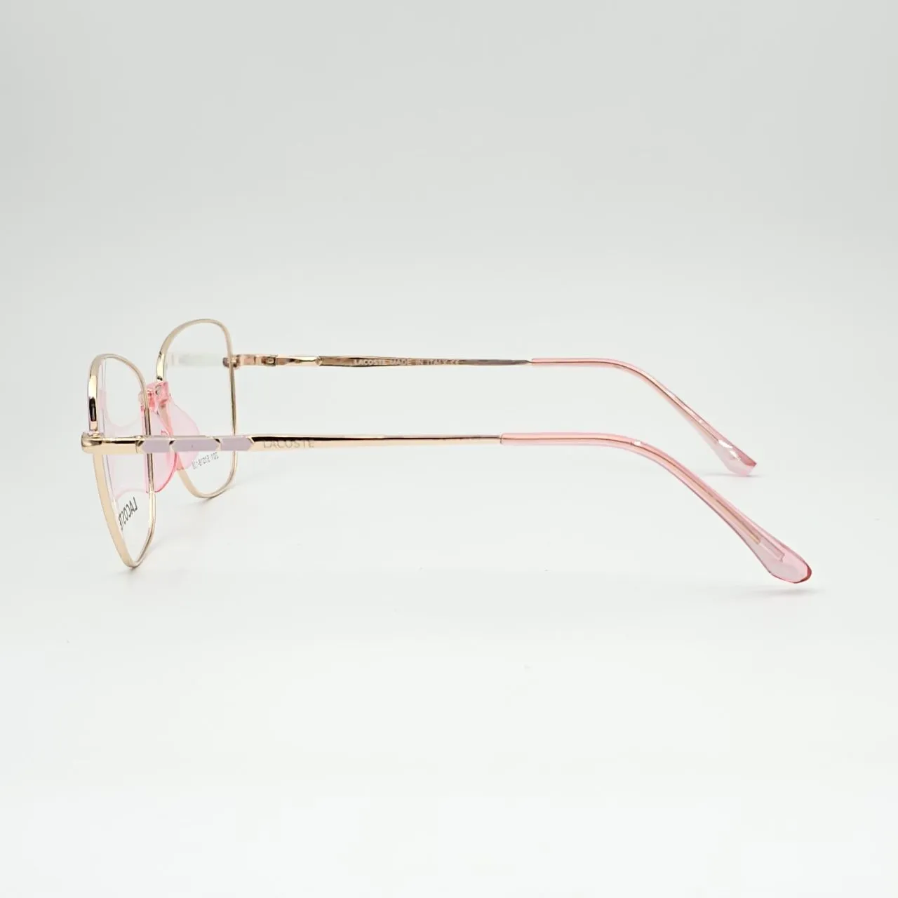 عکس نمای 45 درجه عینک طبی زنانه فلزی گربه ای برند Lacoste کد 201 رنگ gold,pink