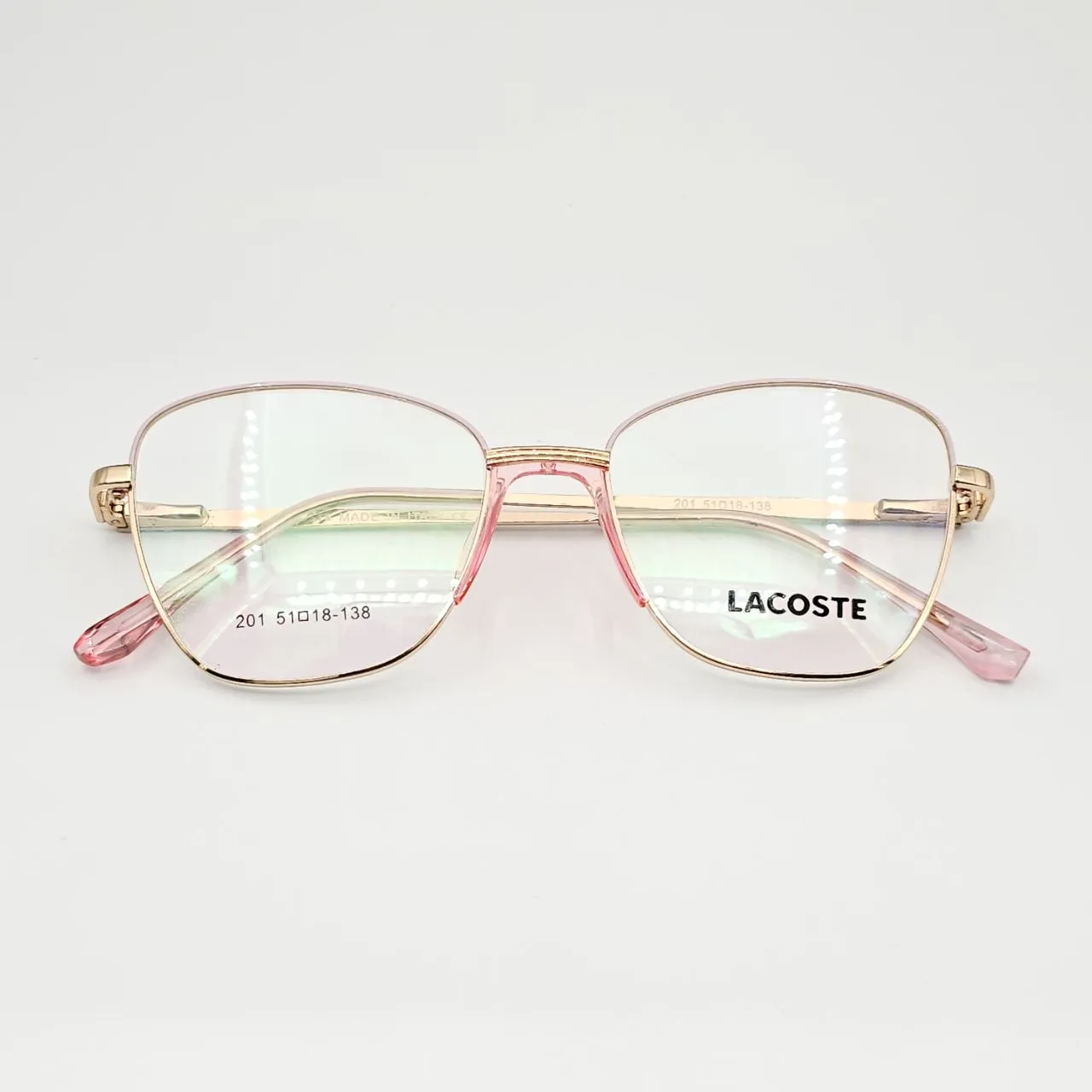 عکس نمای دسته عینک طبی زنانه فلزی گربه ای برند Lacoste کد 201 رنگ gold,pink
