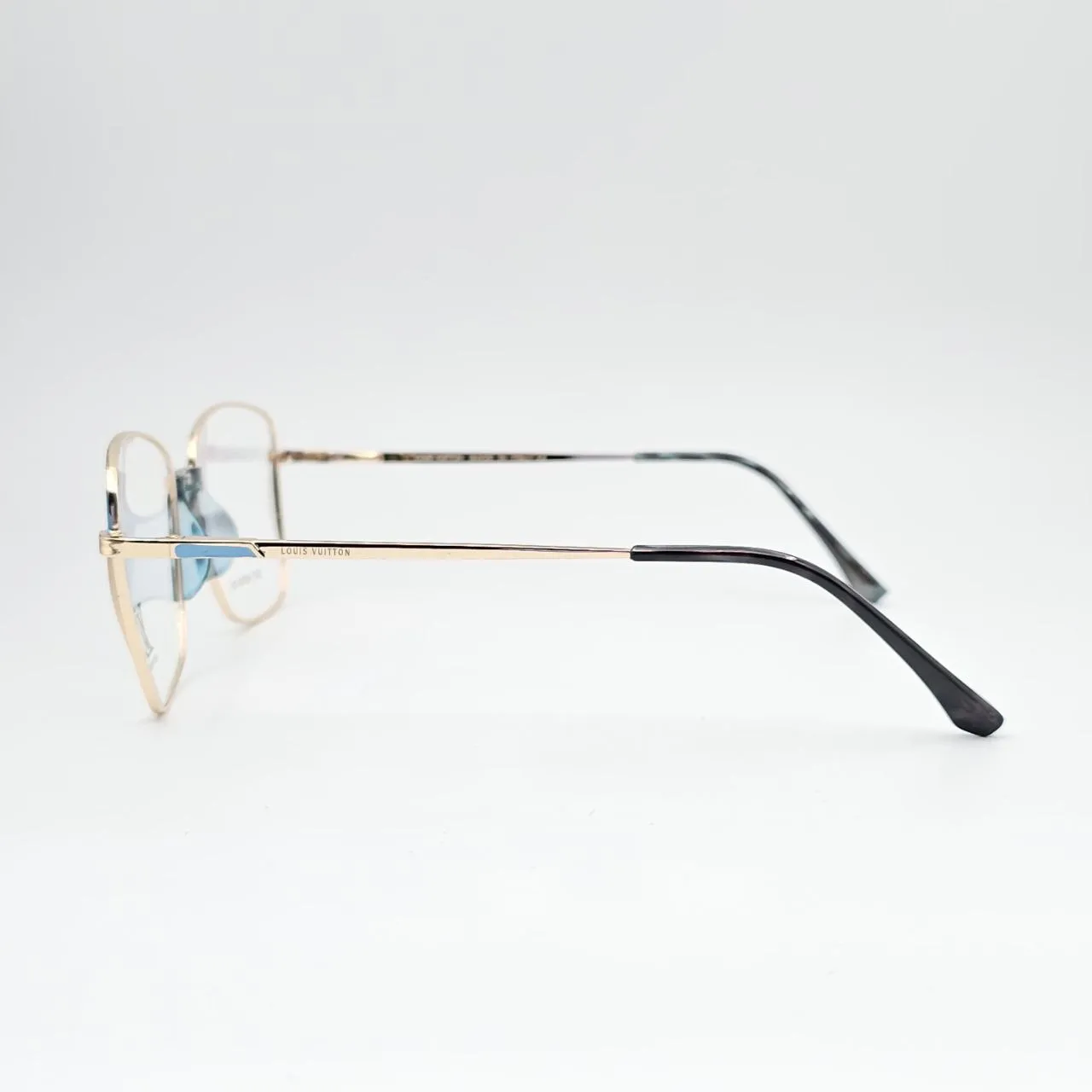 عکس نمای دسته عینک طبی فلزی Louis Vuitton رنگ gold,blue
