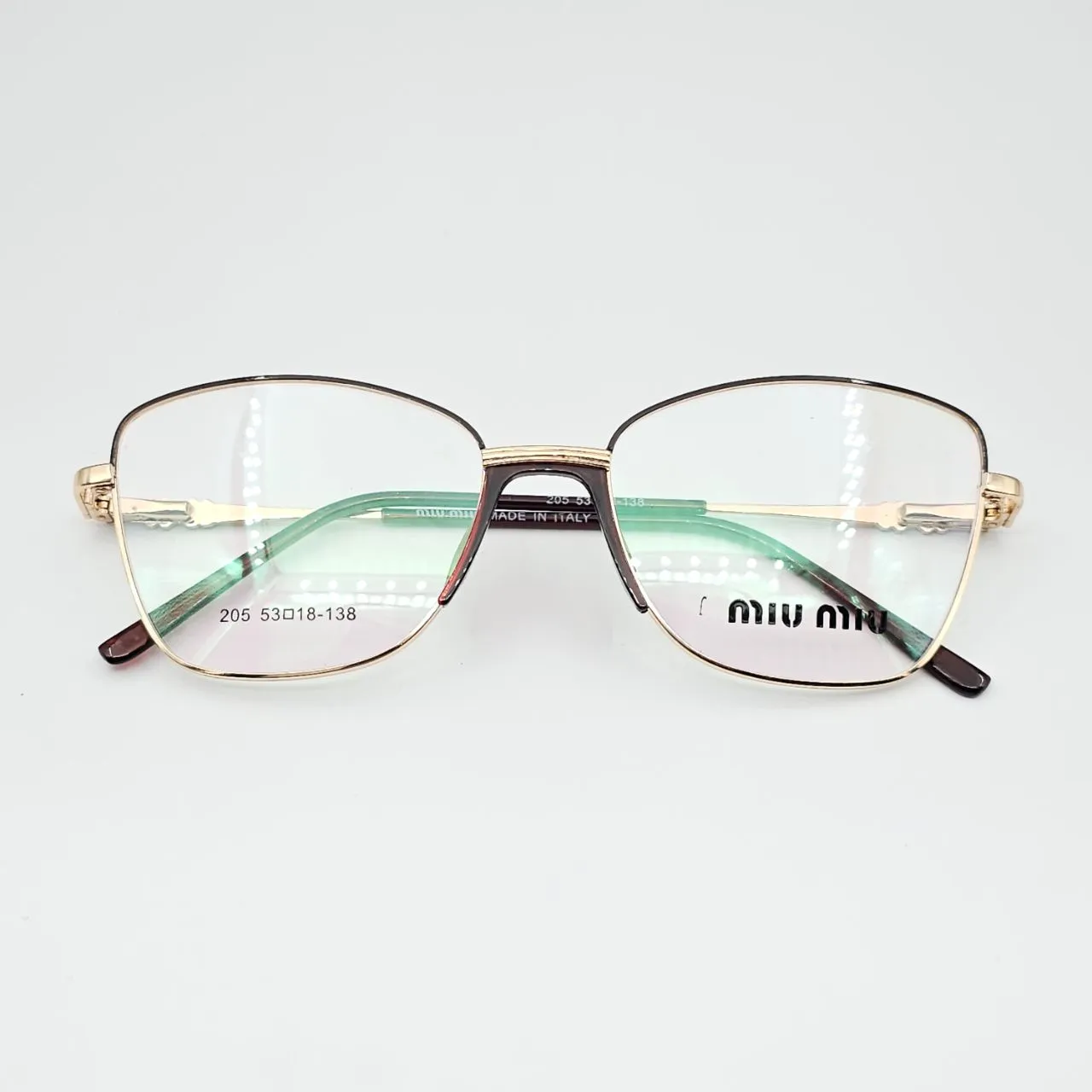عکس نمای دسته عینک طبی مردانه-زنانه miu miu کد 205 رنگ gold,brown