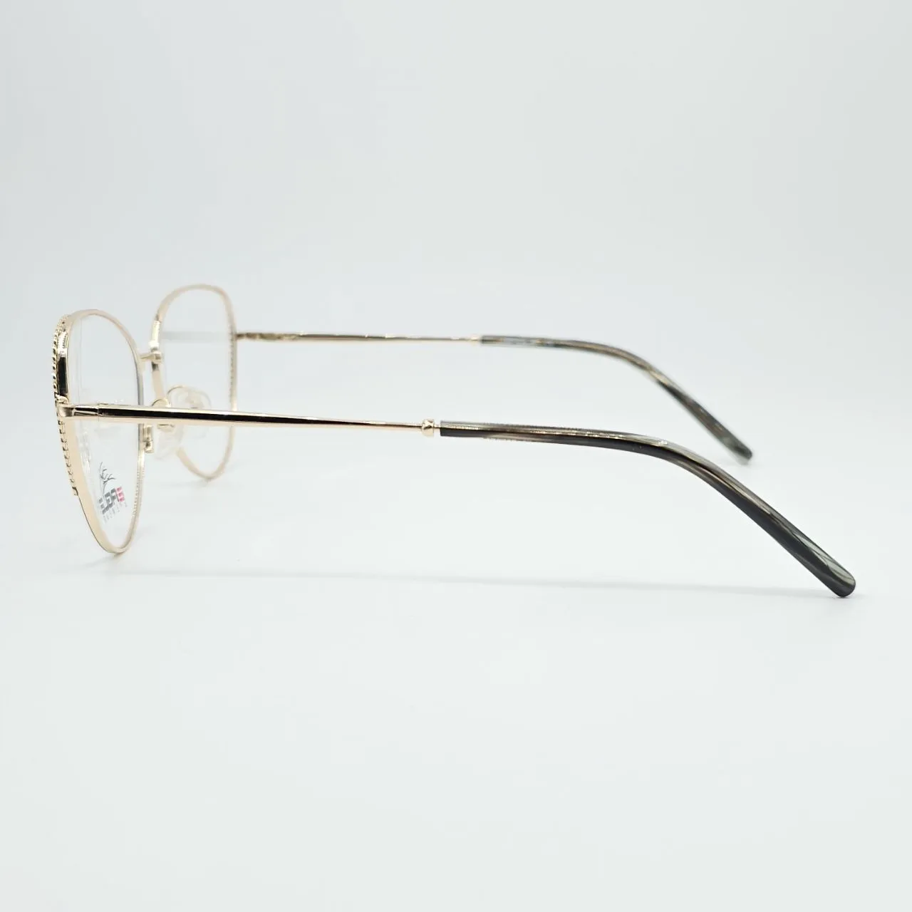 عکس نمای دسته عینک طبی  مثلثی Eagle Eyewear رنگ black,gold