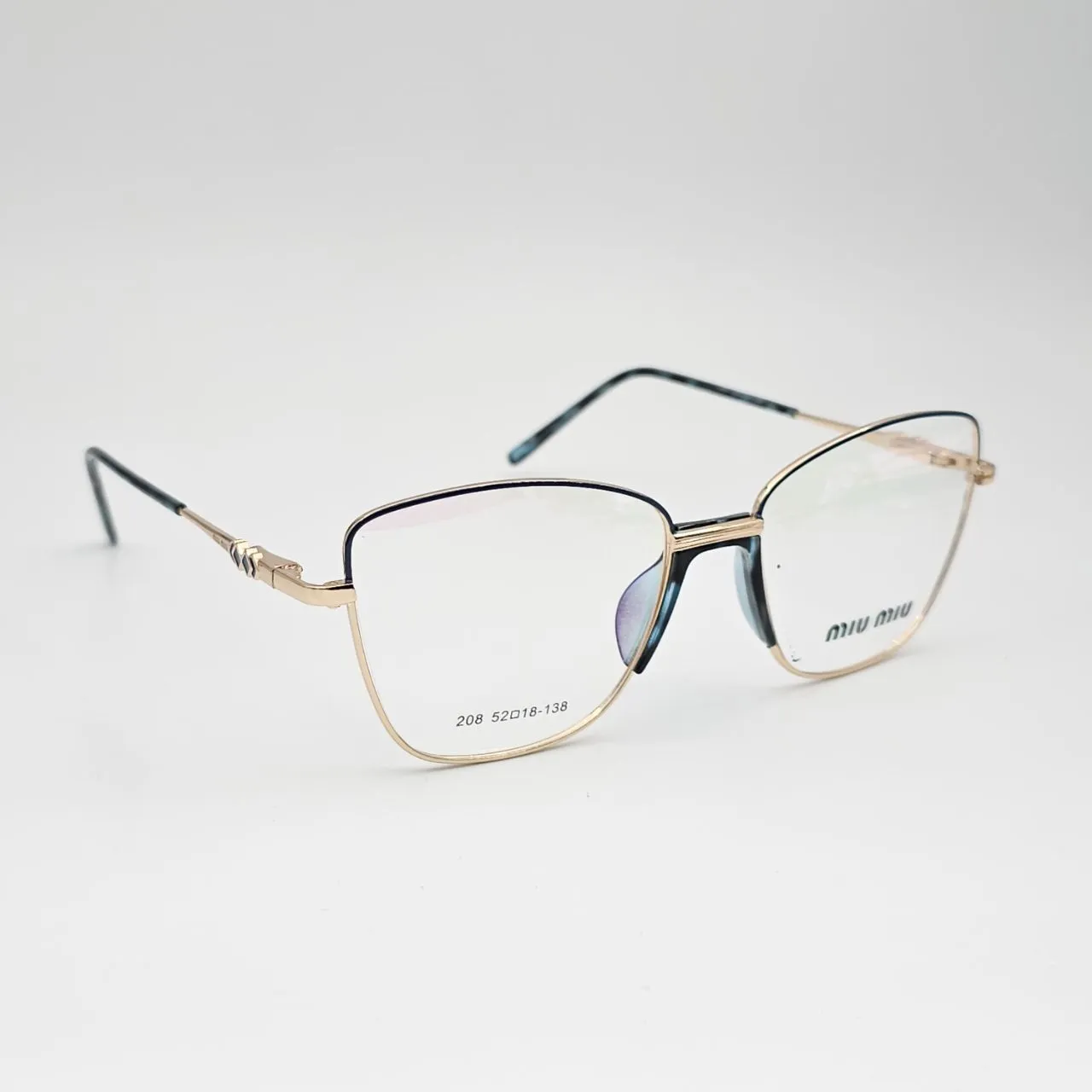 عکس نمای 45 درجه عینک طبی زنانه miu miu کد 208 رنگ gold,blue