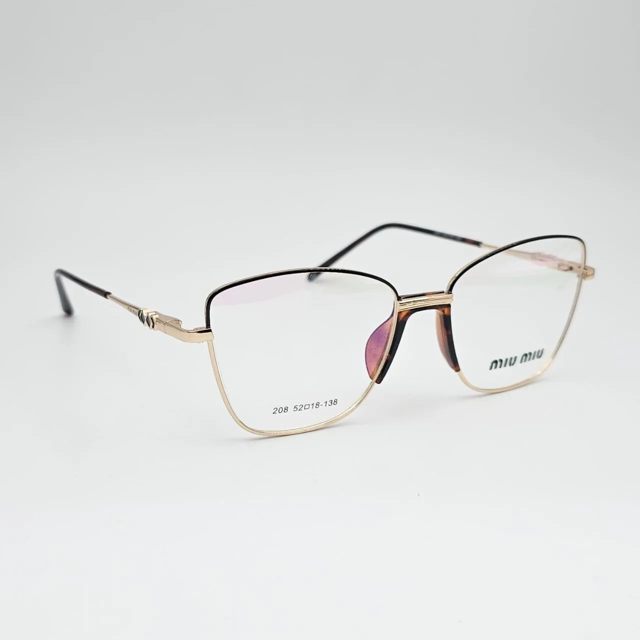 عکس نمای 45 درجه عینک طبی زنانه miu miu کد 208 رنگ gold,leopard