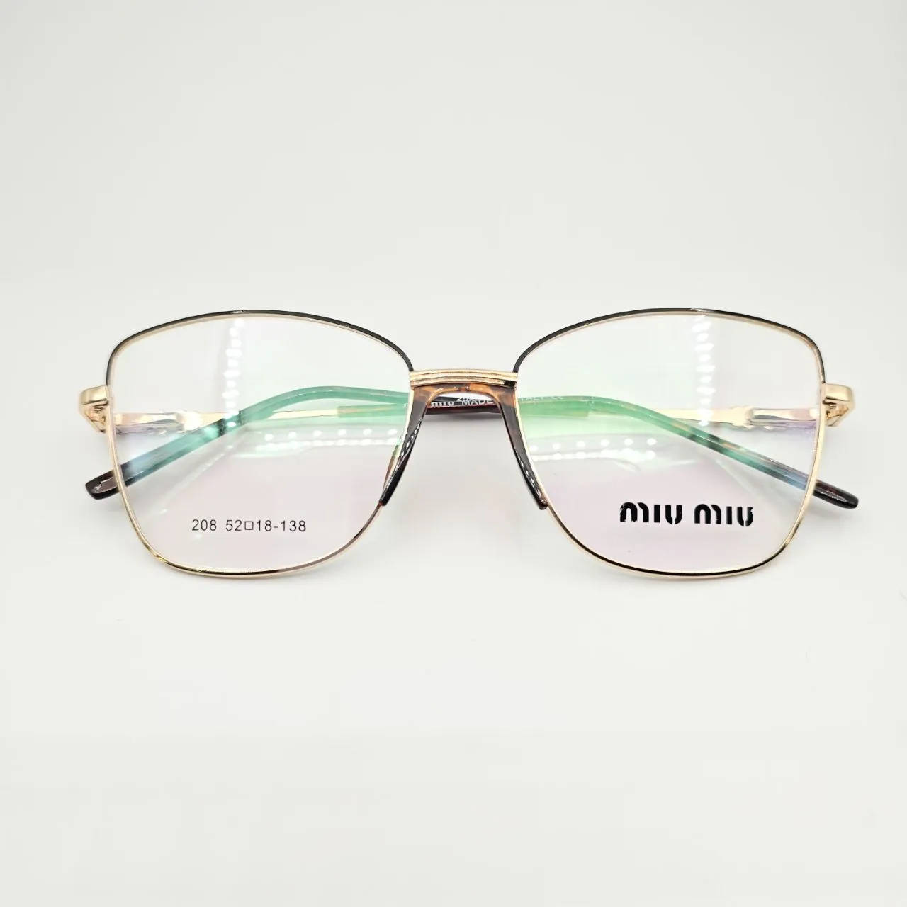 عکس نمای از بالا عینک طبی زنانه miu miu کد 208 رنگ gold,leopard