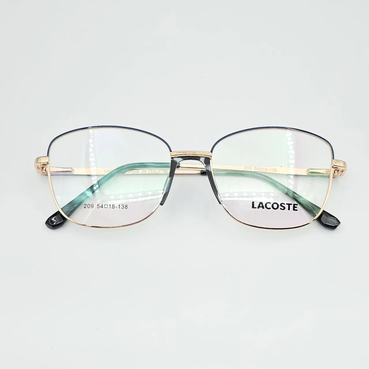 عکس نمای از بالا عینک طبی زنانه Lacoste کد 209 رنگ gold,blue