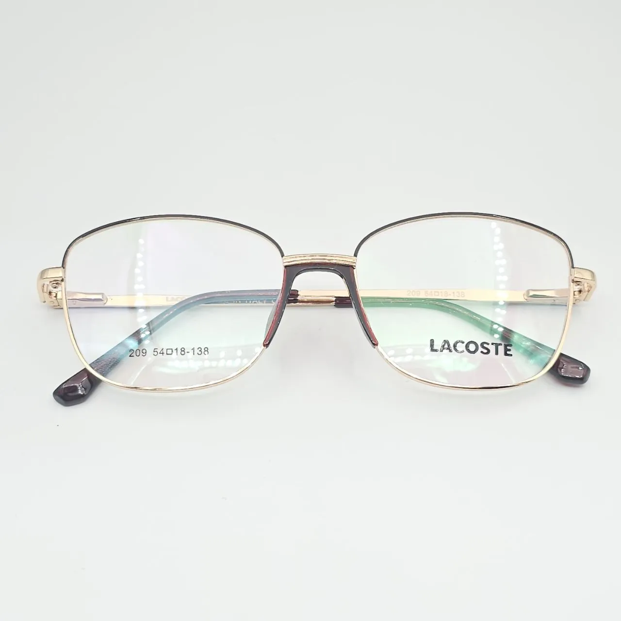 عکس نمای دسته عینک طبی زنانه Lacoste کد 209 رنگ gold,brown