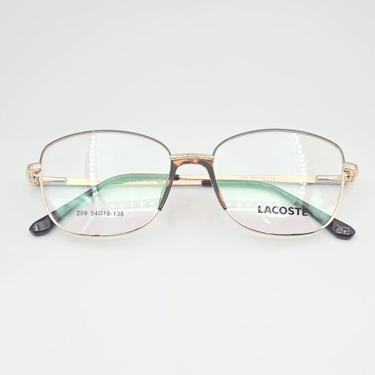 عکس نمای از بالا عینک طبی زنانه Lacoste کد 209 رنگ gold,leopard