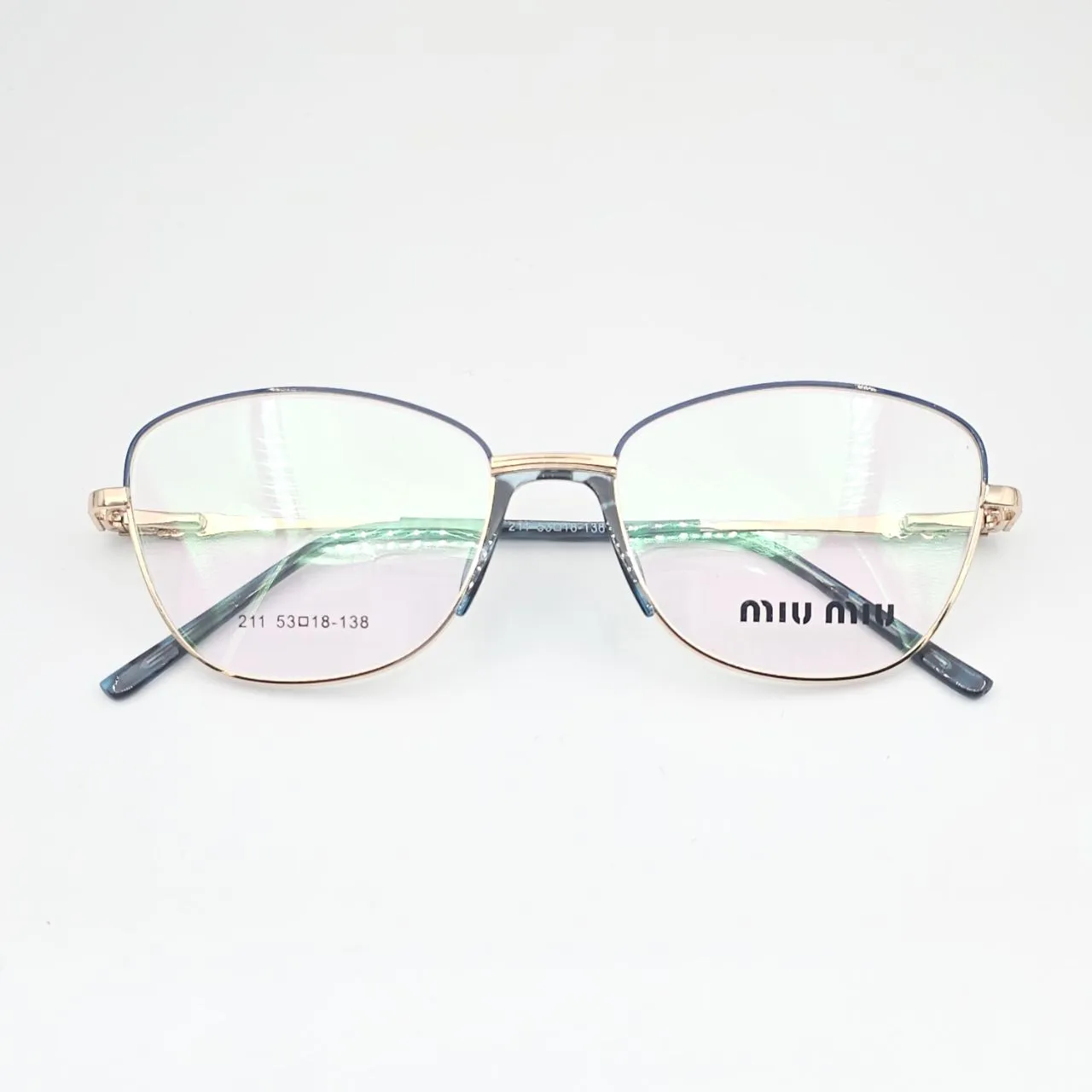 عکس نمای 45 درجه عینک طبی miu miu کد 211 رنگ gold,blue