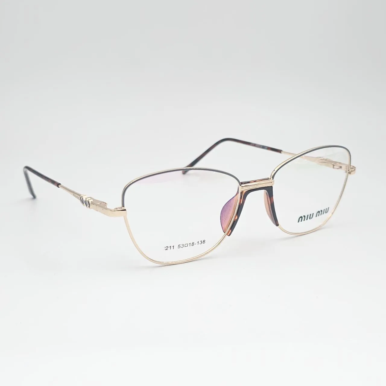 عکس نمای 45 درجه عینک طبی miu miu کد 211 رنگ gold,brown