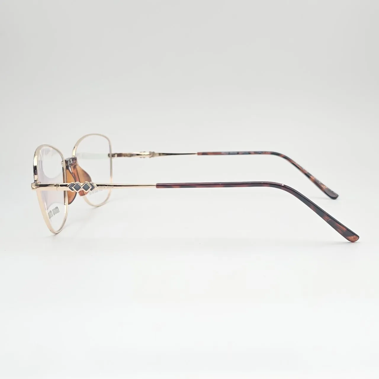 عکس نمای دسته عینک طبی miu miu کد 211 رنگ gold,brown