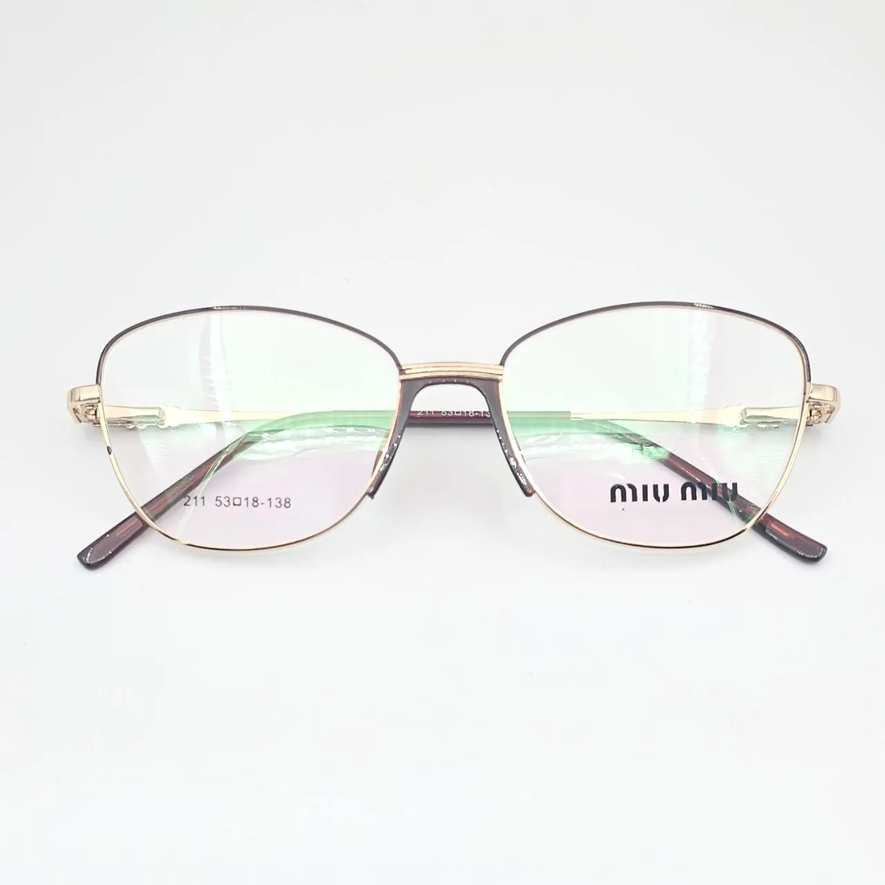عکس نمای دسته عینک طبی miu miu کد 211 رنگ gold,brown|glossy