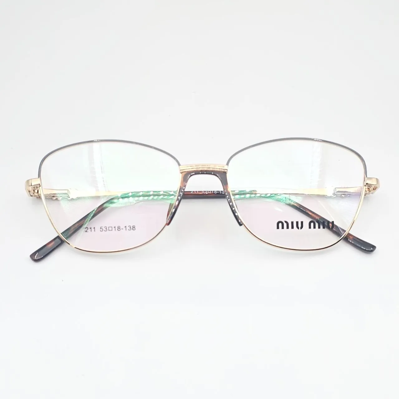 عکس نمای از بالا عینک طبی miu miu کد 211 رنگ gold,brown