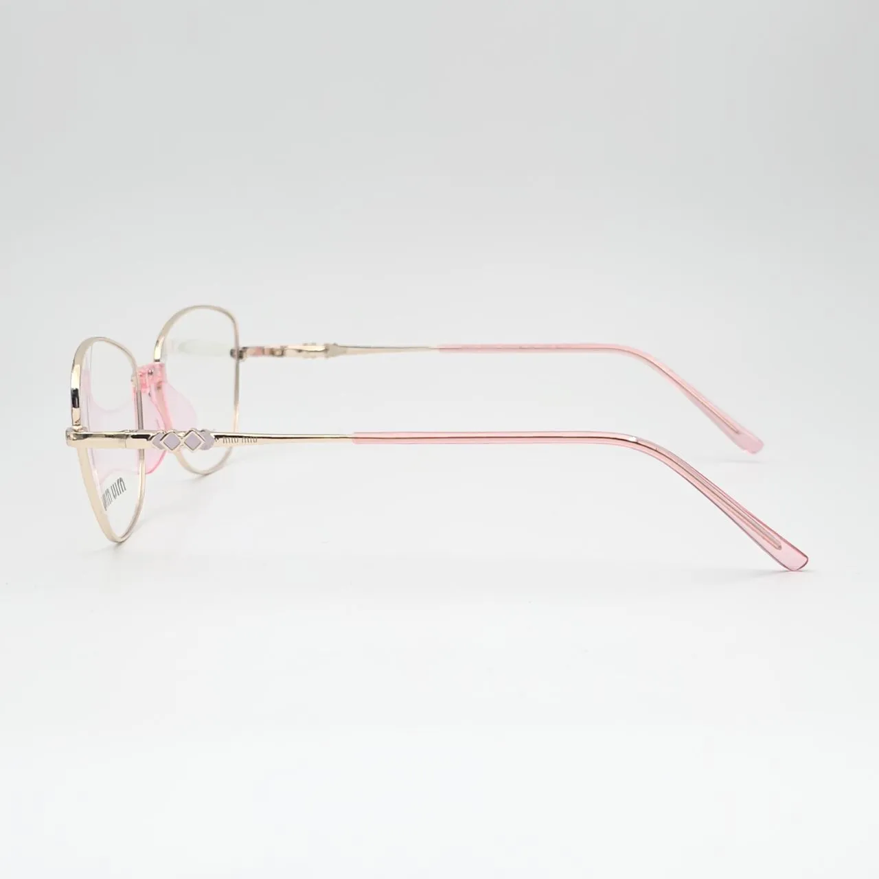عکس نمای از بالا عینک طبی miu miu کد 211 رنگ gold,pink