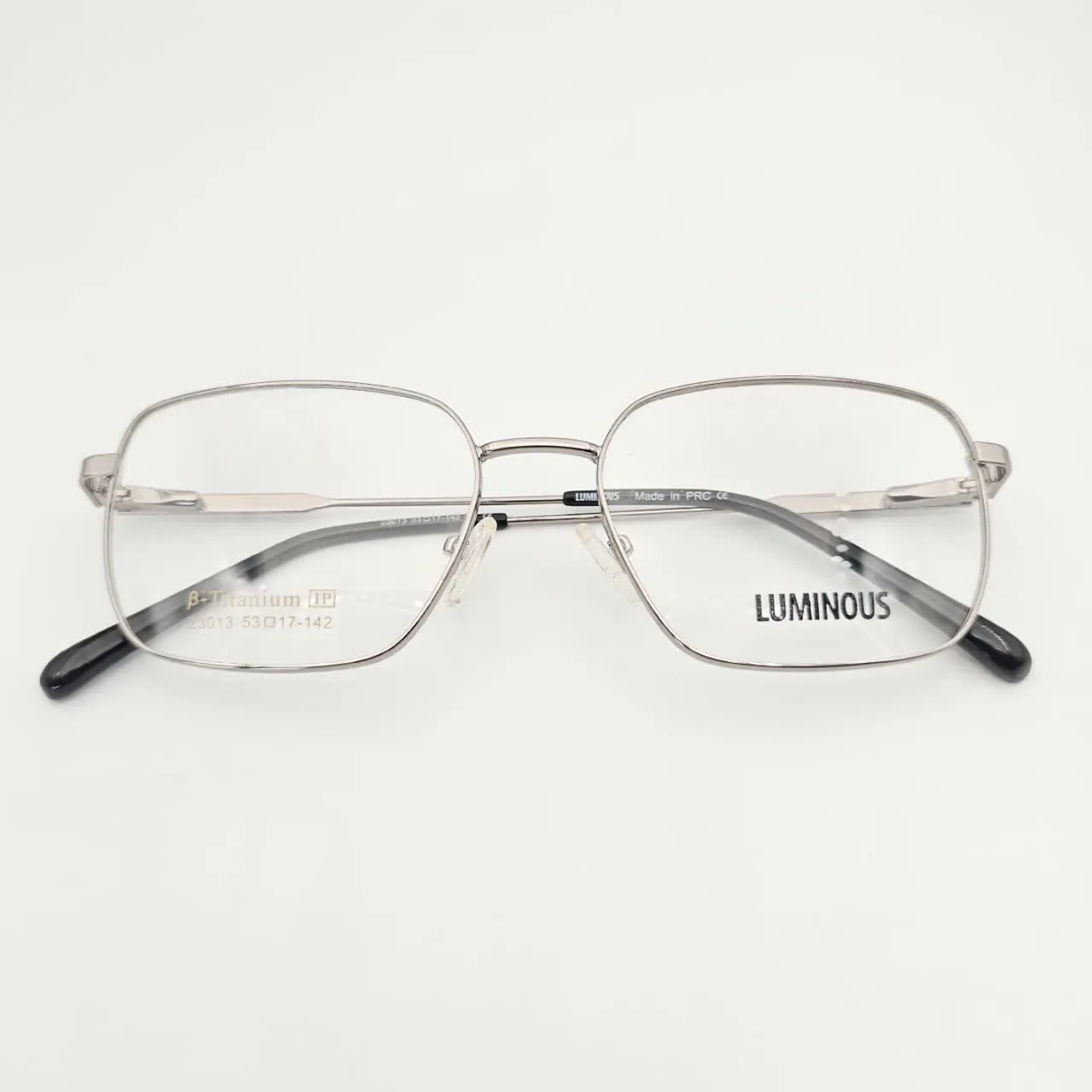 عکس نمای از بالا عینک طبی تیتانیوم LUMINOUSفوق سبک رنگ silver