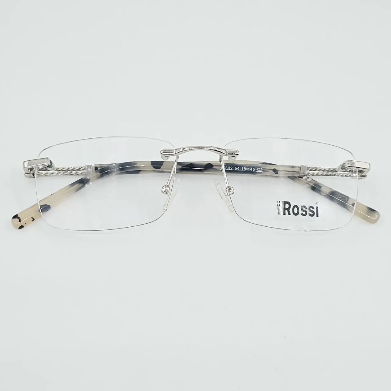 عکس نمای از بالا عینک طبی بدون دور Rossi رنگ silver