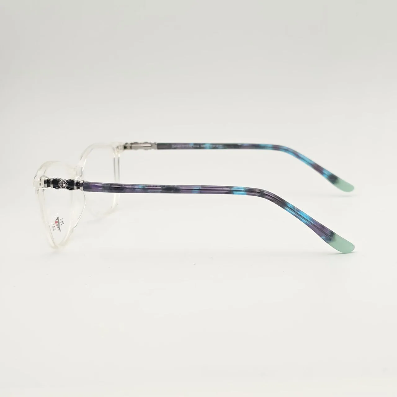 عکس نمای دسته عینک طبی زنانه Seven فریم کائوچو استیت دسته آبی بنفش رنگ blue,transparent