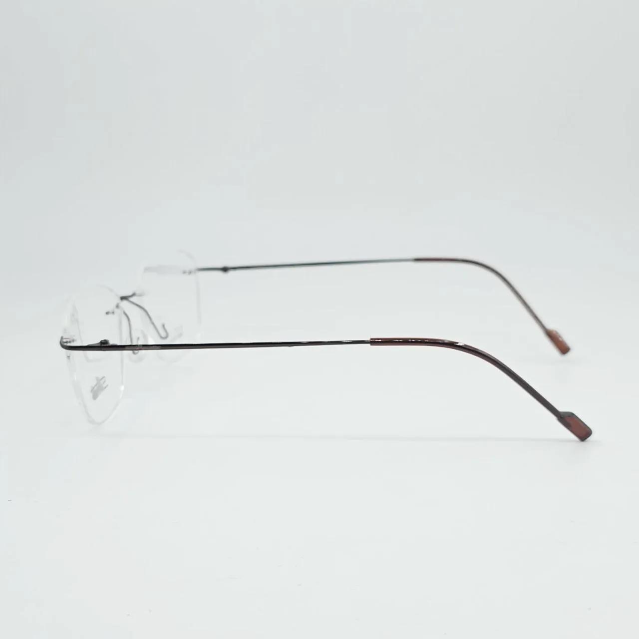 عکس نمای 45 درجه عینک بدون فریم برند Silhouette رنگ brown