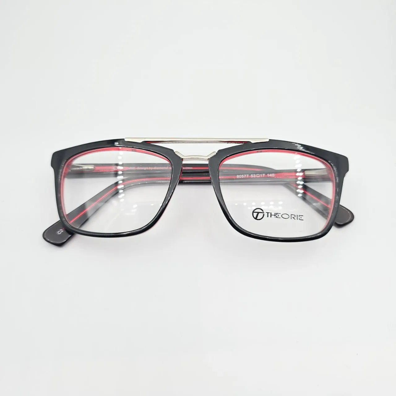 عکس نمای از بالا عینک طبی مربعی دوپل THEORIE رنگ black,red