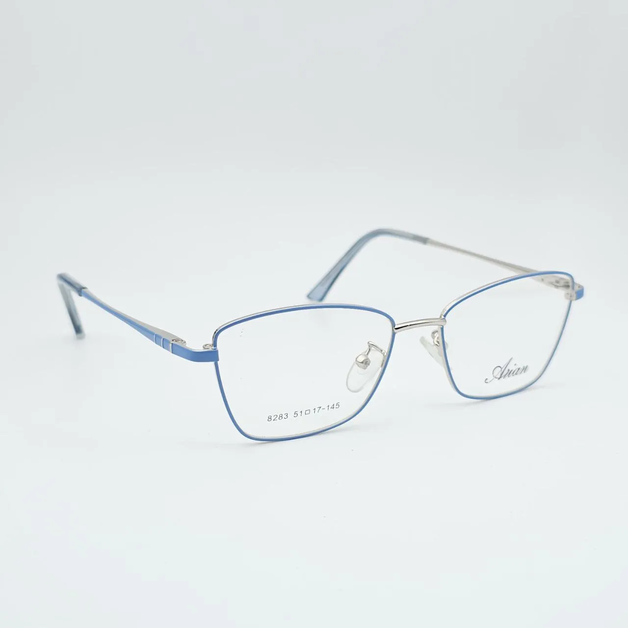 عکس نمای 45 درجه عینک طبی آبی طلایی برند آرین ARIAN مدل 8283 رنگ silver,blue