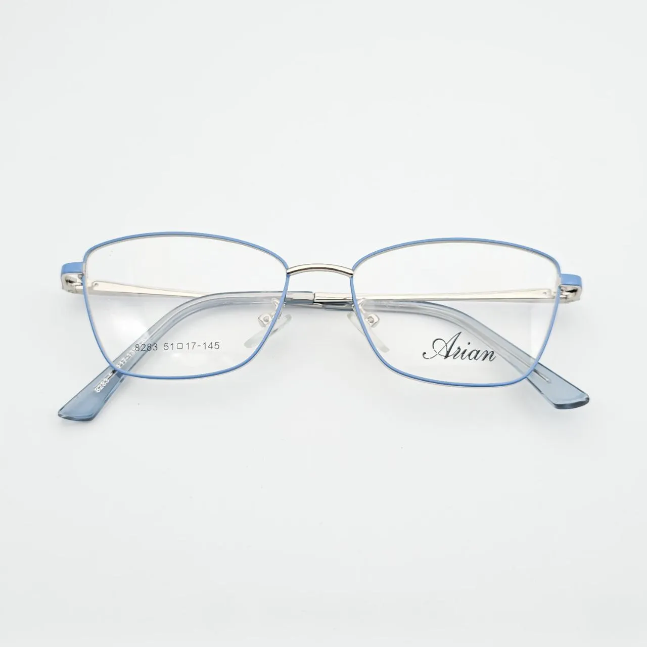عکس نمای از بالا عینک طبی آبی طلایی برند آرین ARIAN مدل 8283 رنگ silver,blue