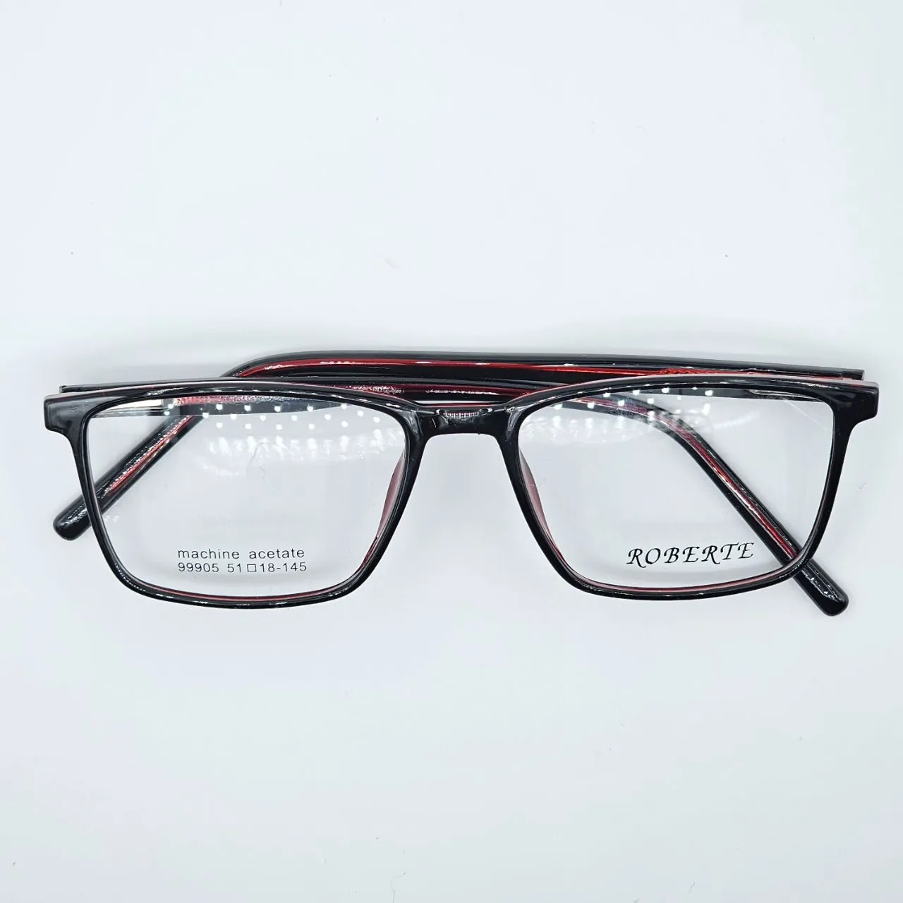 عکس نمای 45 درجه عینک طبی مردانه رنگ black,red