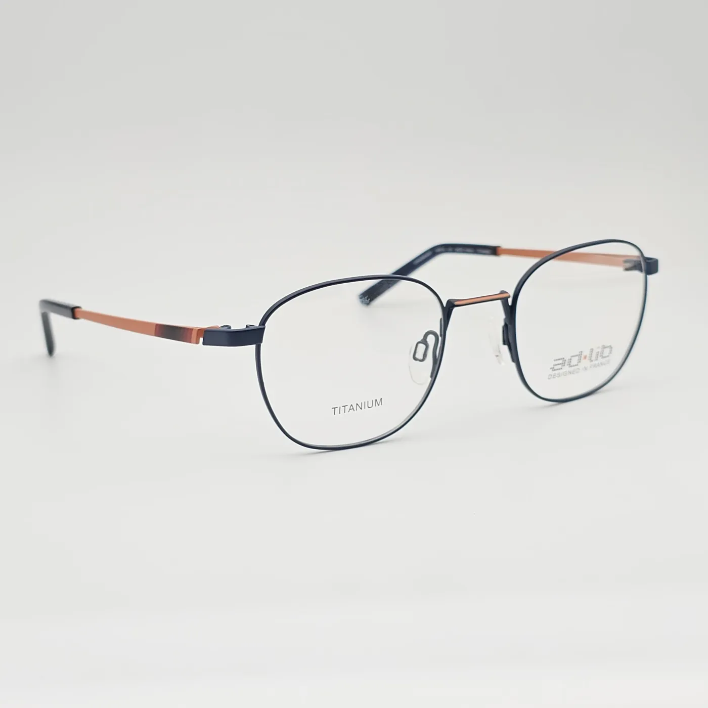 عکس نمای 45 درجه عینک طبی فلزی زنانه و مردانه رنگ navy,orange:سرمه‌ای