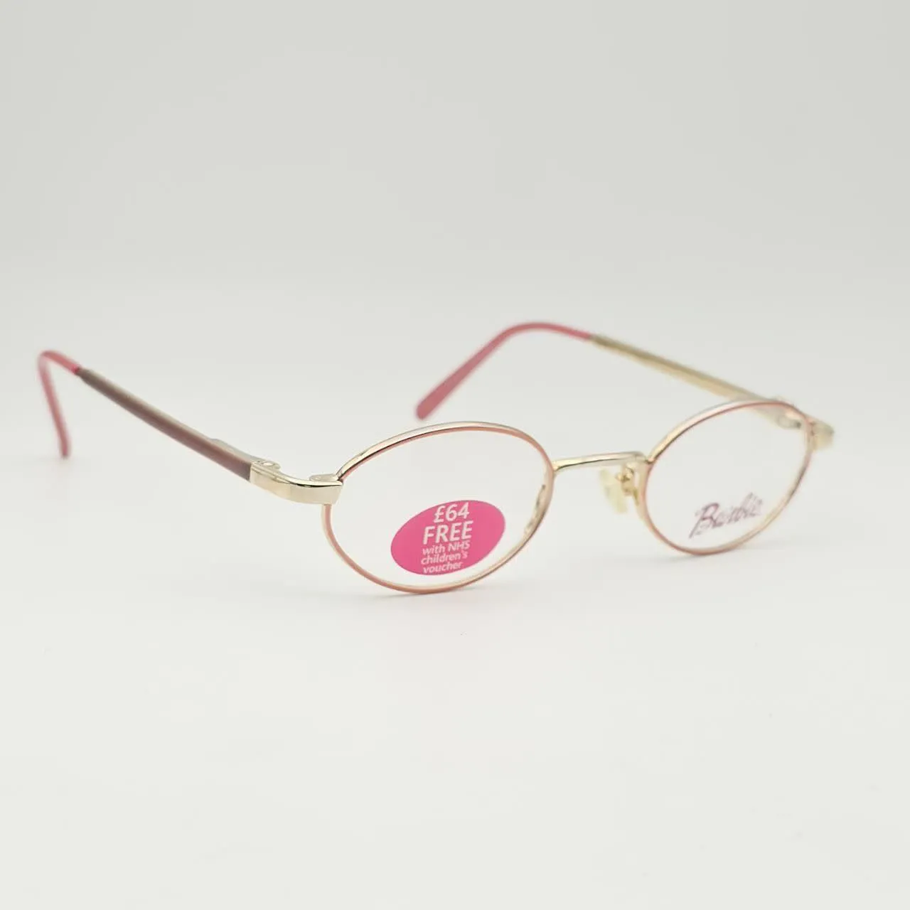 عکس نمای 45 درجه عینک طبی بچگانه Barbie مدل بیضی و گرد رنگ gold,pink