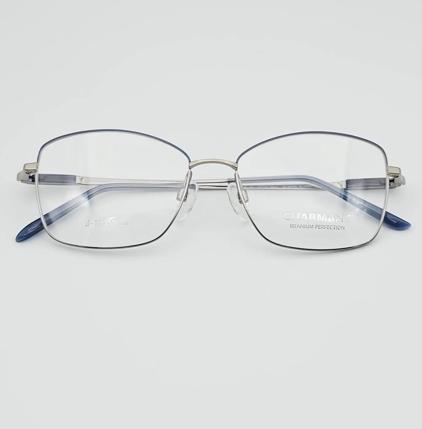 عکس نمای از بالا عینک طبی تیتانیومی برندCHARMANT رنگ silver:نقره‌ای,navy