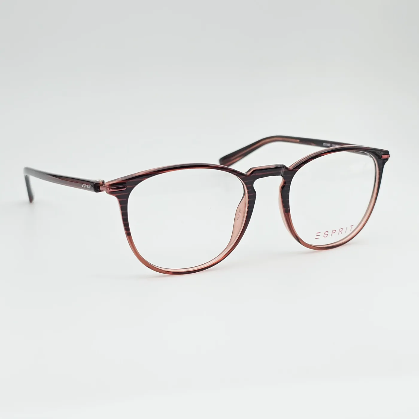 عکس نمای 45 درجه عینک زنانه و مردانه برندESPRIT رنگ brown,orange:پلنگی با سایه نارنجی