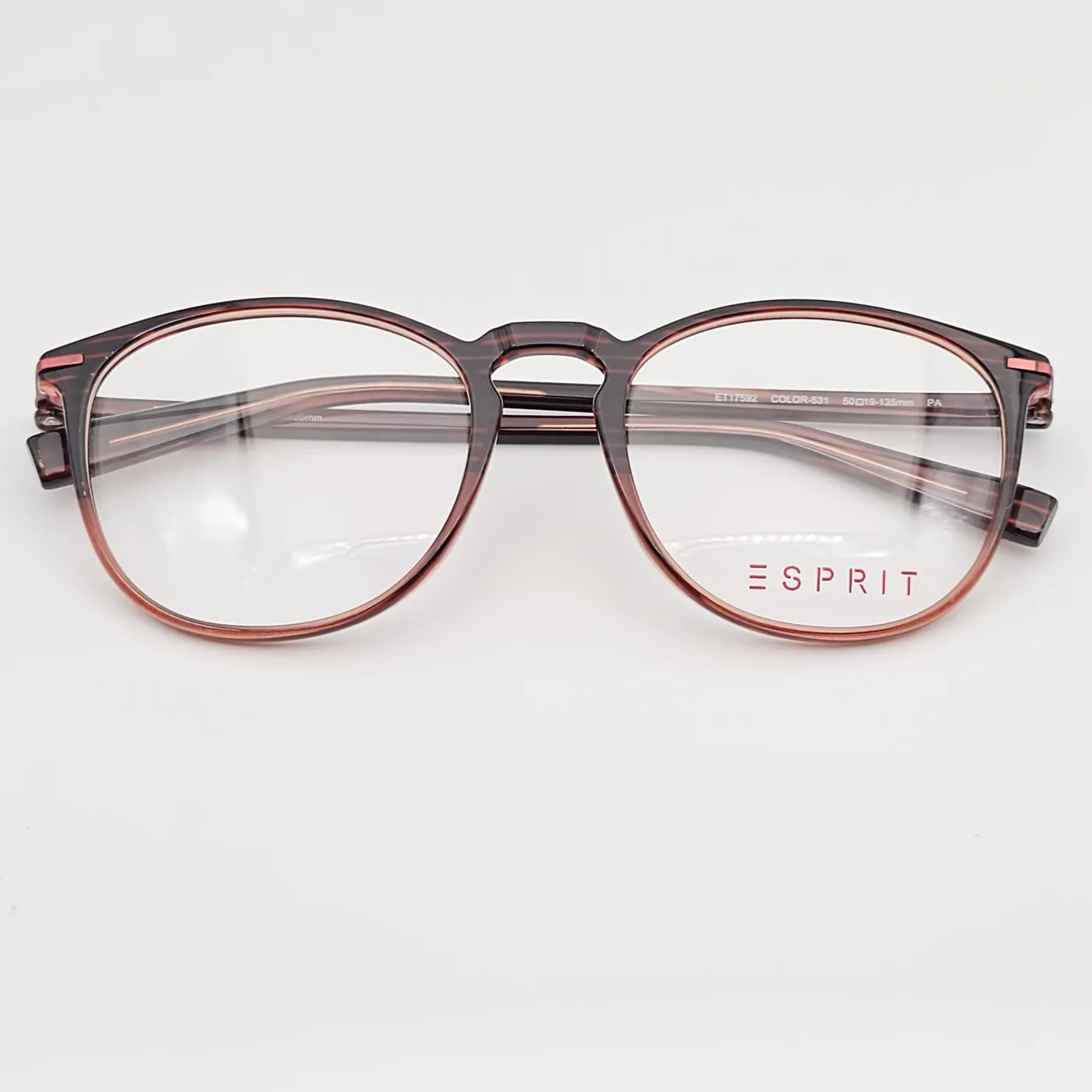 عکس نمای از بالا عینک زنانه و مردانه برندESPRIT رنگ brown,orange:پلنگی با سایه نارنجی