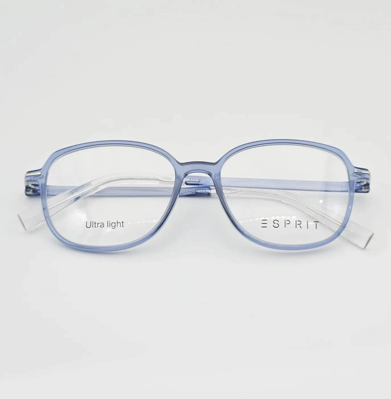 عکس نمای از بالا عینک طبی زنانه و مردانه برند ESPRIT رنگ blue:آبی شفاف مات