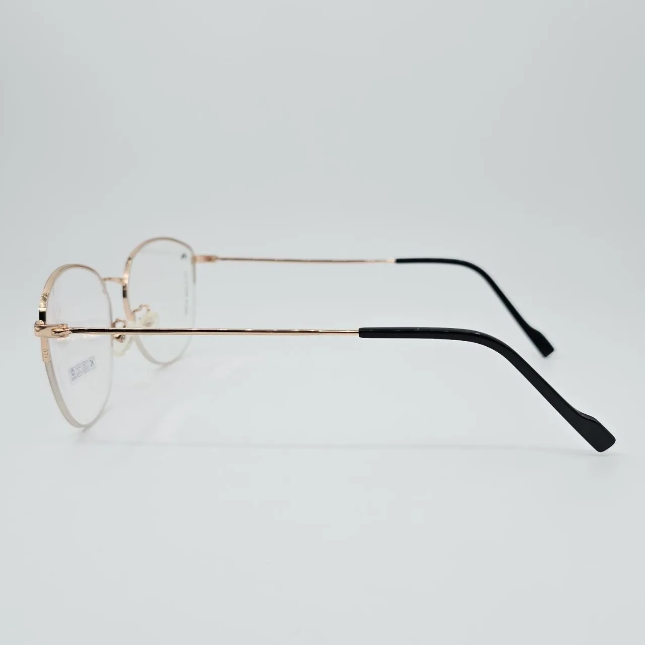 عکس نمای دسته عینک طبی زنانه نیم فریم گربه ای رنگ black,gold