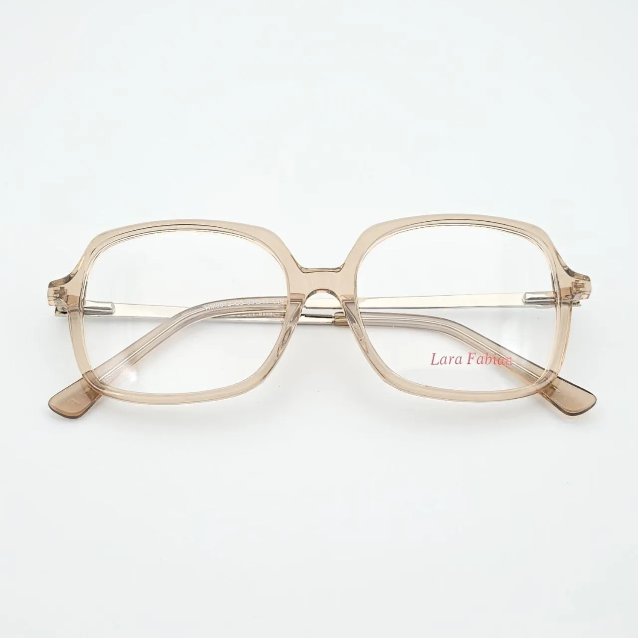 عکس نمای از بالا عینک طبی رنگ بژ مربعی برند LARA FABIAN  مدل HM8012 رنگ gold,beige