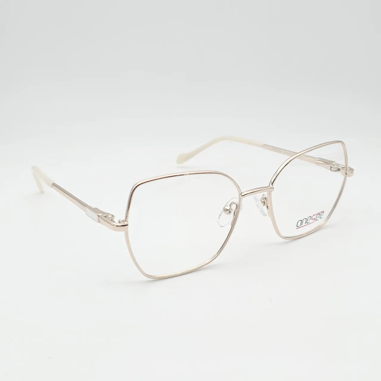 عکس نمای 45 درجه عینک طبی فلزی گربه‌ای OneSee رنگ white,gold
