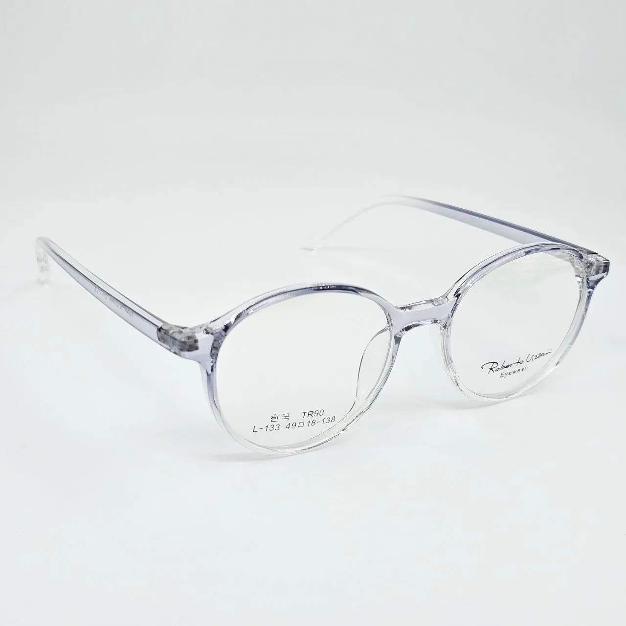 عکس نمای 45 درجه عینک طبی شفاف TR-90 برند ROBERTO رنگ blue,transparent