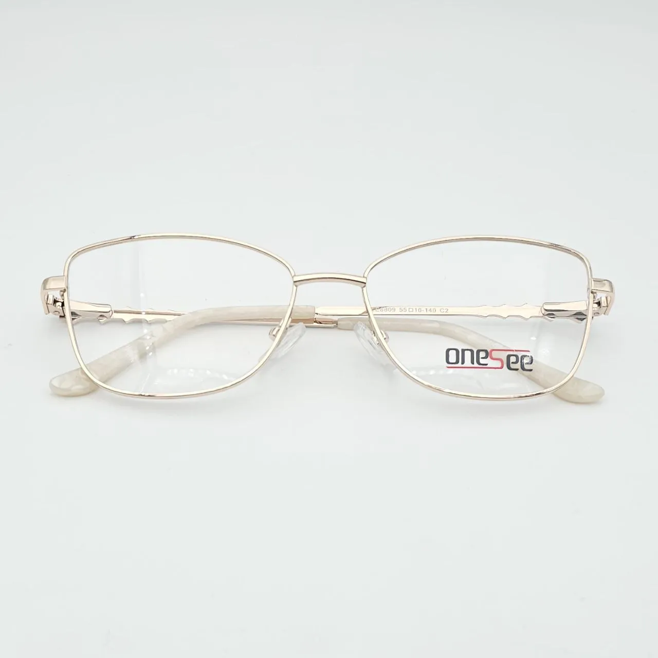 عکس نمای از بالا عینک زنانه فلزی برند  OneSee رنگ white,gold