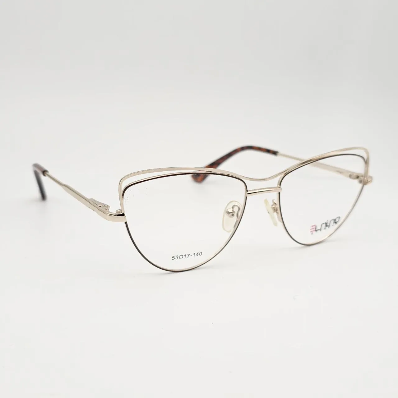 عکس نمای 45 درجه عینک طبی زنانه برند ELNINO کد NK8066 رنگ gold,leopard