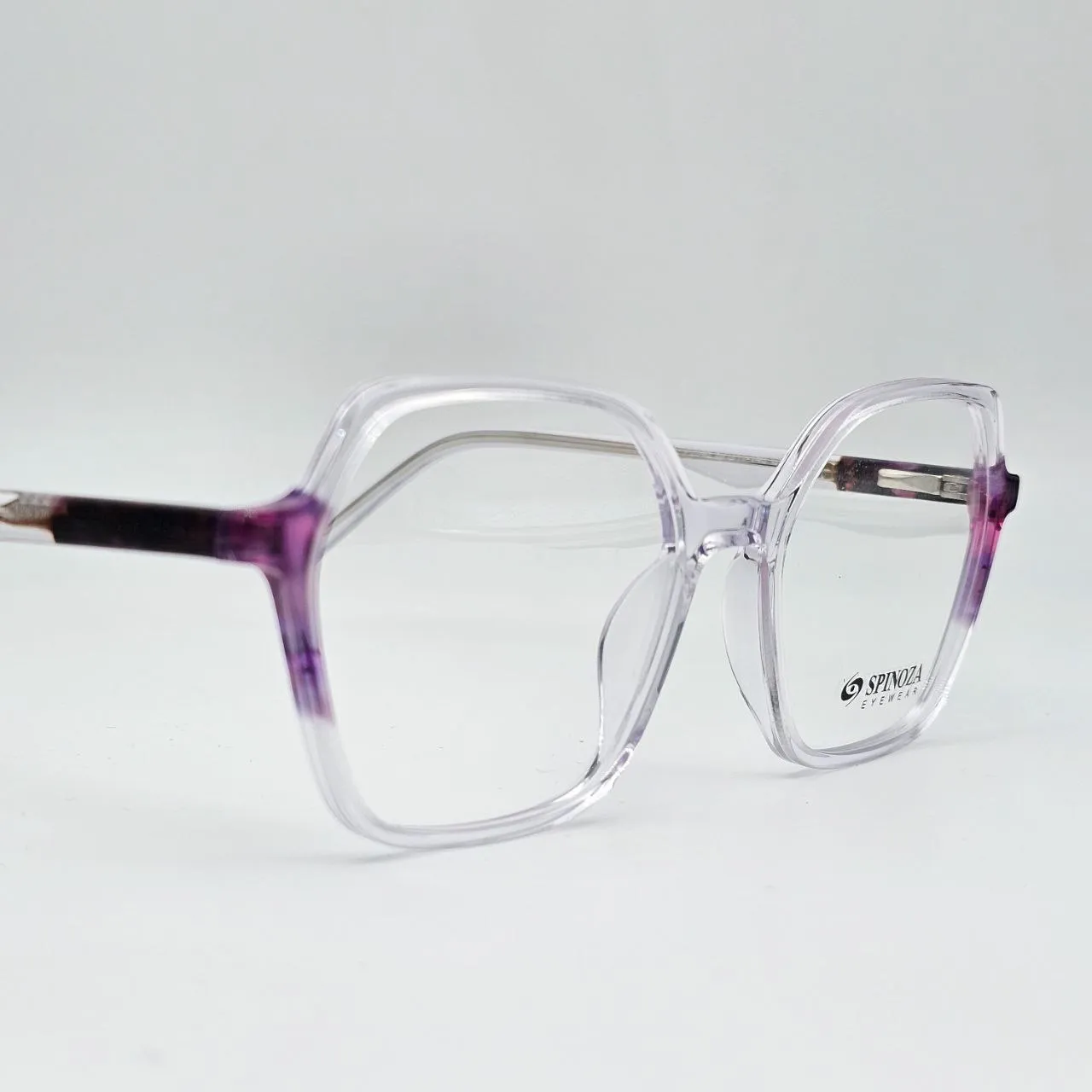 عکس نمای 45 درجه عینک زنانه شفاف چندضلعی Spinoza رنگ purple,transparent