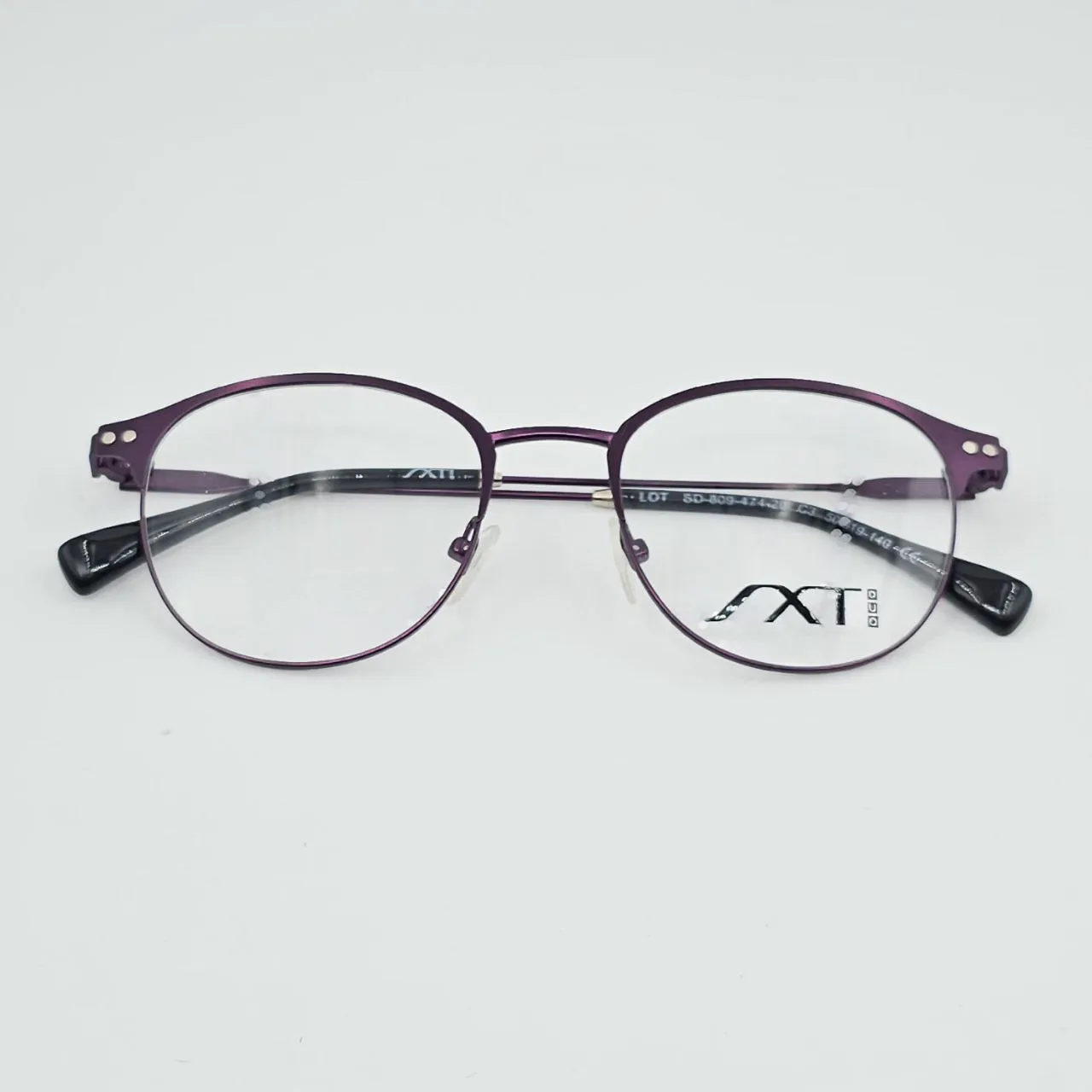 عکس نمای از بالا خرید عینک طبی XTI با کاور آفتابی رنگ purple