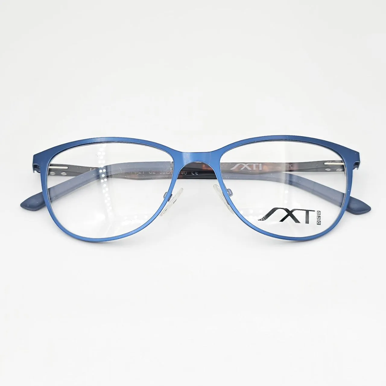 عکس نمای از بالا عینک کاوردار زنانه برند SXT رنگ blue,leopard
